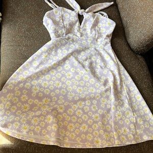 Purple fit n flare dress with an adjustable straps set and back tie.